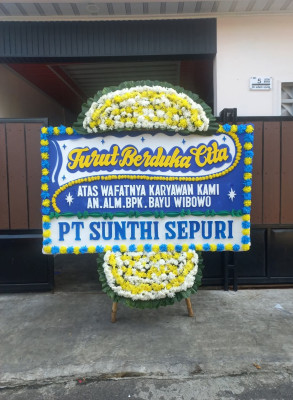 Papan Bunga Duka di Sawo