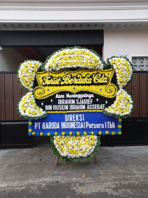 Papan Bunga Duka di Sawo