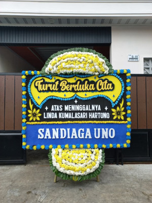 Papan Bunga Duka di Sawo