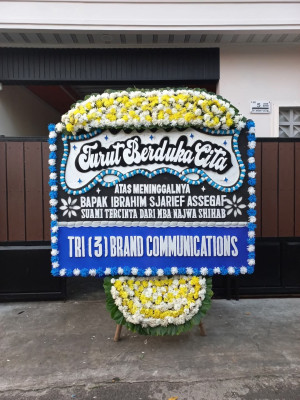 Papan Bunga Duka di Sawo